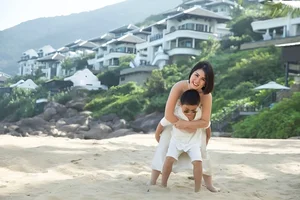 Thuy Tien and Son Mathis Enjoy Wholesome Beach Day - image 6