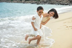 Thuy Tien and Son Mathis Enjoy Wholesome Beach Day - image 5