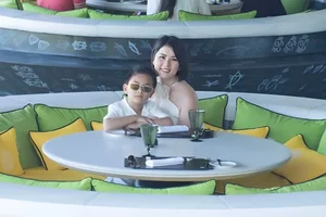 Thuy Tien and Son Mathis Enjoy Wholesome Beach Day - image 1