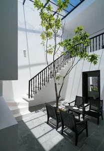 Khanh House: A Modern Hoi An Townhouse Blending Nature and Heritage - image 23
