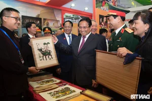 Prime Minister Pham Minh Chinh Inspects Advanced Military Technology at Vietnam International Defense Expo 2024 - image 6