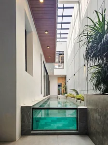 Stunning Resort Villa Design: A Lush Green Oasis Perfect for Luxury Relaxation - image 2