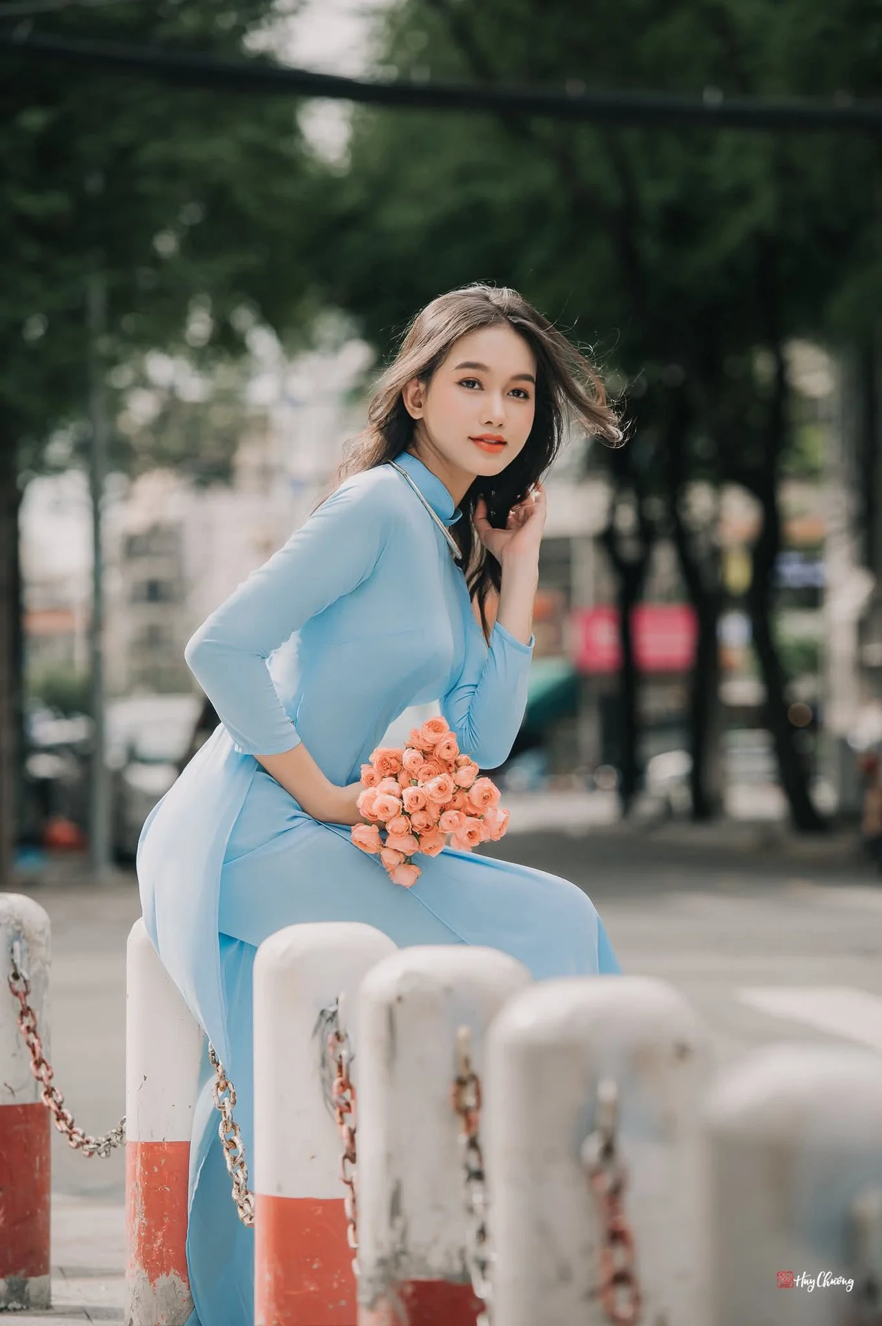 Elegant Pastel Blue Ao Dai in the Heart of the City