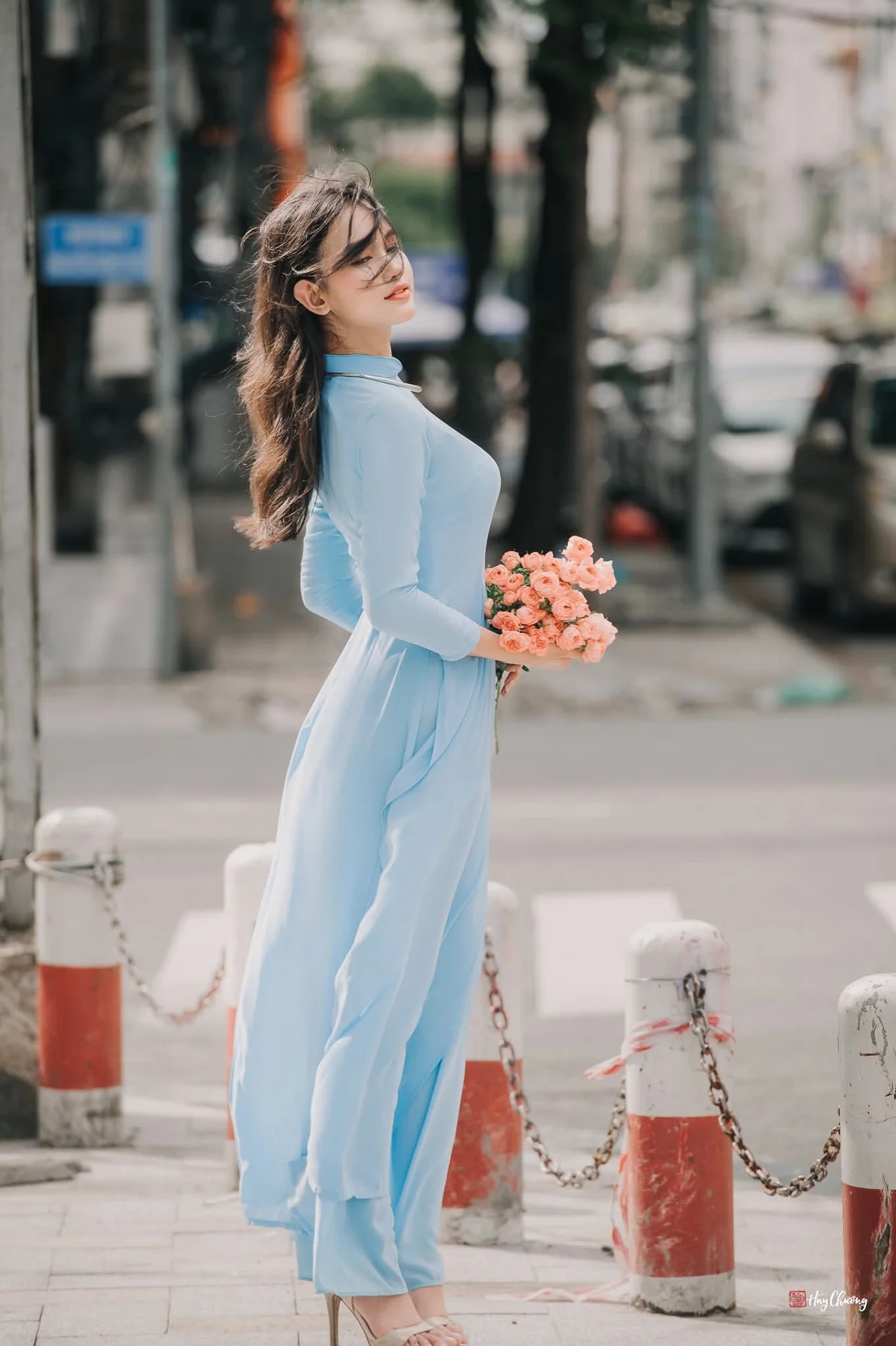 Elegant Pastel Blue Ao Dai in the Heart of the City