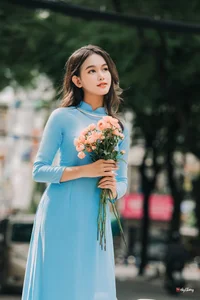 Elegant Pastel Blue Ao Dai in the Heart of the City - image 1