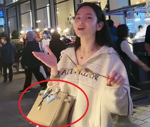 Why Quang Hai Girlfriend Carries the Same Designer Handbag Everywhere - image 2