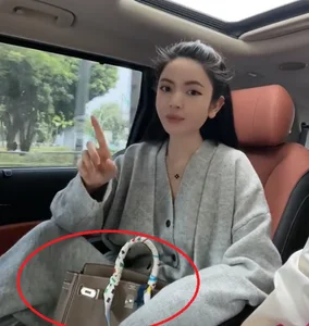 Why Quang Hai Girlfriend Carries the Same Designer Handbag Everywhere - image 1