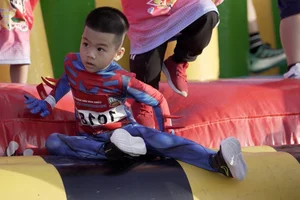 Kun Marathon Hai Phong: 1,500 Young Runners Brave the Track - image 7