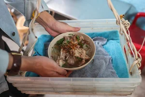 The Unique Rope-Dropping Hu Tieu Noodle Shop in Ho Chi Minh City - image 4