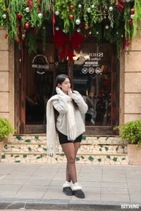 Festive Fashion: Young Women Celebrate Christmas in Style Across Hanoi's Iconic Landmarks - image 10
