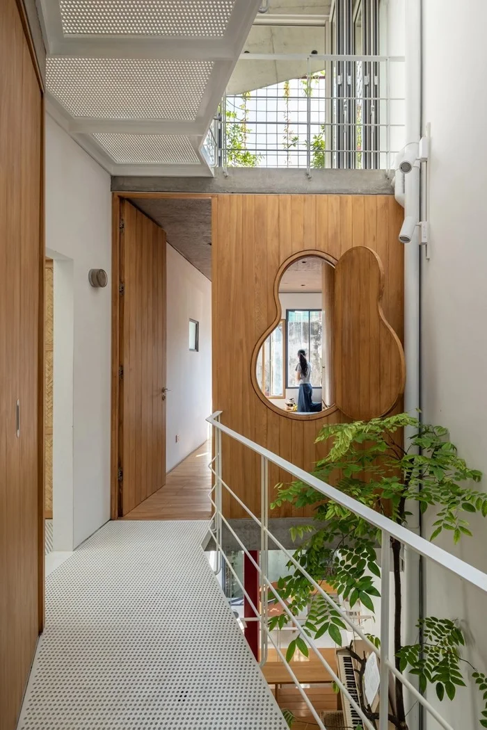 A Hanoi house in a narrow alley filled with natural light and ventilation