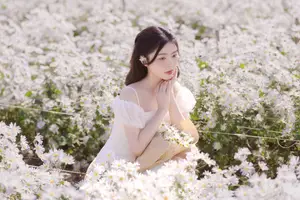 Ethereal Beauty: Young Woman in White Dress with Bouquet Amidst Dreamy Clouds - image 6