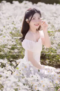 Ethereal Beauty: Young Woman in White Dress with Bouquet Amidst Dreamy Clouds - image 10