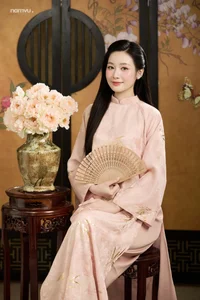 Radiant Grace in Soft Pink Silk Ao Dai: A Poetic Indochine Muse - image 2