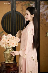 Radiant Grace in Soft Pink Silk Ao Dai: A Poetic Indochine Muse - image 13