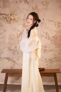 Elegant Asian Beauty in Traditional Inspired Dress Discover Timeless Grace and Serene Charm - image 0