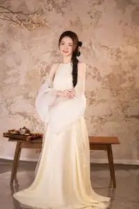 Elegant Asian Beauty in Traditional Inspired Dress Discover Timeless Grace and Serene Charm - image 3