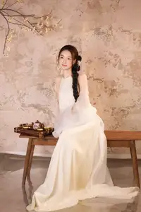 Elegant Asian Beauty in Traditional Inspired Dress Discover Timeless Grace and Serene Charm - image 2