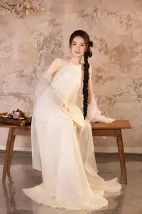 Elegant Asian Beauty in Traditional Inspired Dress Discover Timeless Grace and Serene Charm - image 4