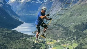 Thrilling Rope Ladder Climb on Norway's Majestic Mountains - image 5