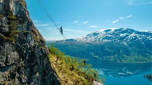 Thrilling Rope Ladder Climb on Norway's Majestic Mountains - image 0