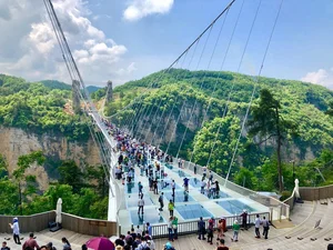 Crossing the Record-Breaking Zhangjiajie Glass Bridge in Hunan Province, China - image 6