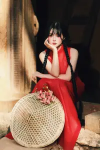 Captivating Vietnamese Beauty: Graceful Girl in Traditional Red Ao Dai - image 1