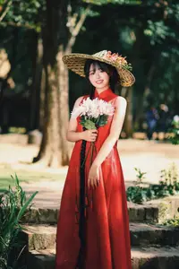 Captivating Vietnamese Beauty: Graceful Girl in Traditional Red Ao Dai - image 16