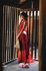 Captivating Vietnamese Beauty: Graceful Girl in Traditional Red Ao Dai - image 12