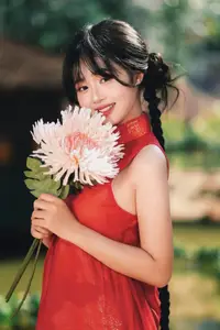 Captivating Vietnamese Beauty: Graceful Girl in Traditional Red Ao Dai - image 0