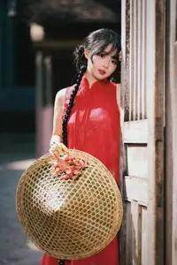 Captivating Vietnamese Beauty: Graceful Girl in Traditional Red Ao Dai - image 6