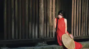 Captivating Vietnamese Beauty: Graceful Girl in Traditional Red Ao Dai - image 2
