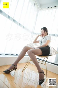 Professional Elegance: Model Xi Ran in the Latest IESS Office-Themed Photo Series - image 17