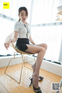Professional Elegance: Model Xi Ran in the Latest IESS Office-Themed Photo Series - image 10