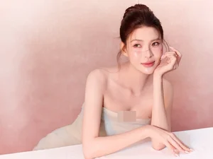 Elegant Birthday Photoshoot: Thúy Diễm Shines in a Voluminous White Ruffle Gown for a Sophisticated High-Fashion Celebration - image 3
