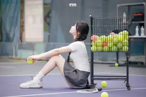 Pensive Break on Court: Young Tennis Player Recharges Energy After Intense Training Session - image 5