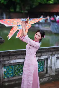 VGU No.182: Graceful Pink Ao Dai & Lotus Flowers – Enchanting Vietnamese Beauty - image 0