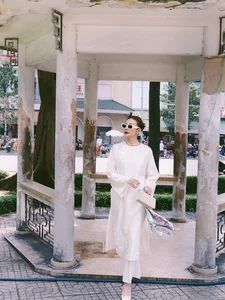 Timeless Elegance: Supermodel Thanh Hằng and Vietnamese Stars Shine in Traditional Ao Dai - image 8