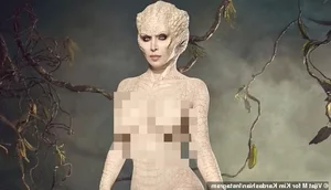 Kim Kardashian Stuns in Breathtaking Albino Alligator Halloween Costume - image 3