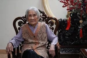 The Timeless Beauty of Mrs. Bang Tam: A 103-Year-Old Legend from Old Hanoi - image 2