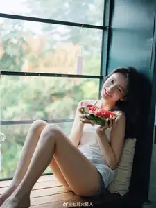 Gentle Moments: A Young Woman's Natural Beauty by the Sunlit Window - image 1