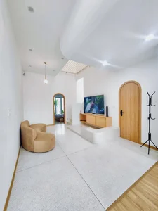 Innovative Townhouse Design: Swapping the Living Room with a Central Kitchen Island - image 4