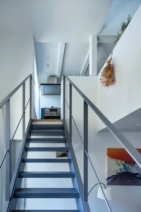 Innovative 27m2 Micro-House Design: Maximizing Sunlight and Airflow in Narrow Alleys - image 9