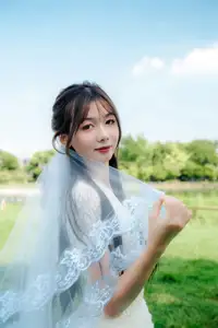 VGU No.180: The Pure Elegance of a Girl in a White Dress with Gentle Lilies - image 1