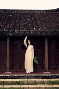 Timeless Vietnamese Beauty: Elegant Ao Dai Girl Amidst Ancient Architecture - Photo 597392964_1911130843144618_1615706383643237778_n.jpg - image 1