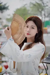 Elegant Vietnamese Beauty in White Ao Dai Serene Portrait with Pink Lilies on Ancient Stone Steps - image 4