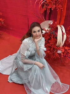 Celebrating Tet 2025: Vietnamese Beauties Showcase Elegance in Traditional Ao Dai Fashion Trends - image 1
