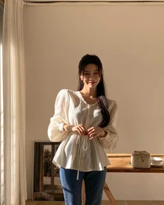 4 Essential White Tops Every Woman Needs for a Chic Spring and Summer Wardrobe - image 6