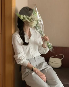 4 Essential White Tops Every Woman Needs for a Chic Spring and Summer Wardrobe - image 8