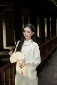 Graceful East Asian Beauty: Woman in Traditional Attire, Elegant with a Paper Fan. - image 6